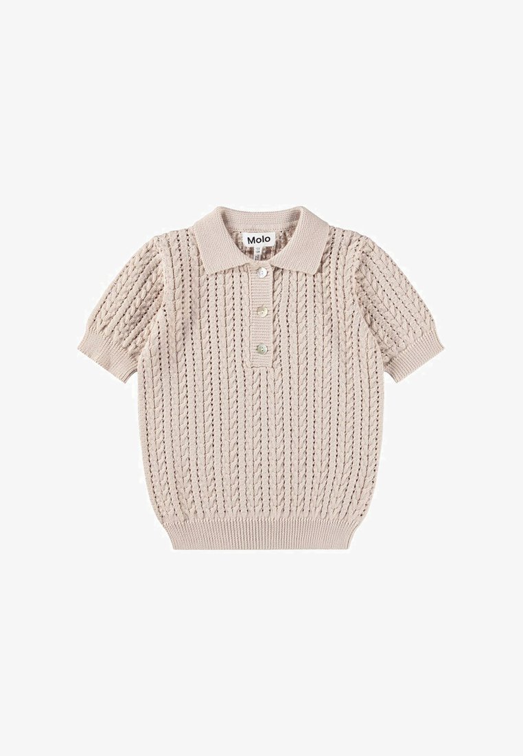 Polo en maille à manches courtes beige, avec un motif texturé, une patte de boutonnage à trois boutons et un col et un ourlet côtelés.