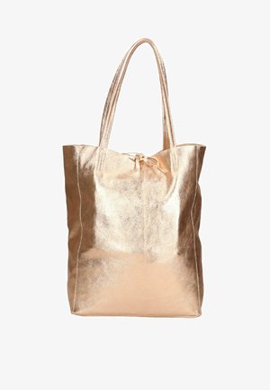 Borsa a spalla in oro rosa metallico con due manici lunghi, chiusura con coulisse, texture liscia e dettagli di cucitura minimi sui lati.