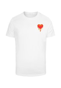 White cotton t-shirt with a red and yellow dripping heart design on the left chest area. Short sleeves and a crew neckline.