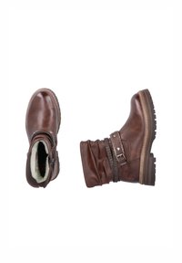 Brown leather ankle boots with a textured cuff, adjustable strap, and a rugged sole. Soft lining visible at the opening.