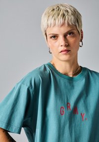 Grimey VOODOO - Camiseta estampada - azul claro