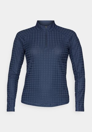 Maglietta a maniche lunghe navy con zip a un quarto, caratterizzata da una texture geometrica, cuciture rinforzate e un tessuto flessibile che assorbe l'umidità.