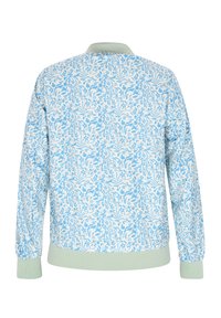 Sweatshirt bleu deschis cu model floral, cu mâneci lungi, manșoane și tiv din material ribat mint, din țesătură moale și cu guler.