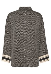 Chemise à manches longues noir et blanc avec un motif zigzag et des poignets blancs arborant deux bandes horizontales noires.