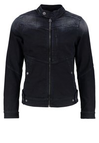 Svart denimjacka med framdragkedja, snap-knappskrage, två sidofickor med knappar och subtilt blekta detaljer vid axlarna.