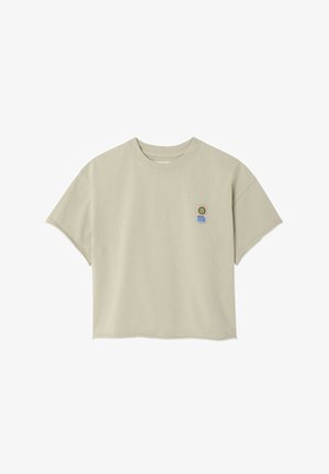 Bordinis trumpomis rankovėmis, kruopščiai trumpintas, su apvalia iškirpte, ant kairiojo krūtinės šono spalvinga mažytė „House of Colors“ emblema.