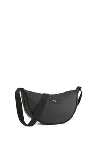 Black shoulder bag with a curved design, made from glossy material. Features a gold logo patch and a black adjustable strap. Zipper closure.