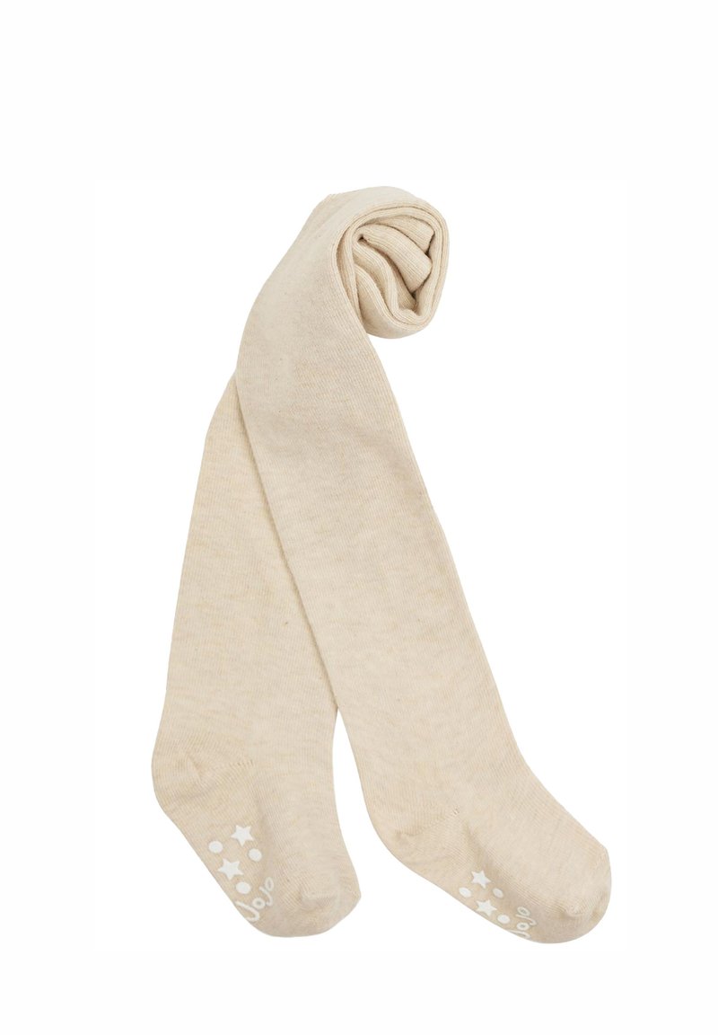 Collant in cotone beige, con texture a coste, arrotolati in cima, con puntini e stelle bianchi antiscivolo sulle suole. Finitura liscia, materiale morbido.