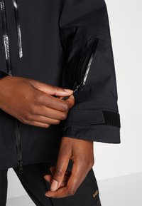 Mammut HALDIGRAT AIR HOODED JACKET WOMEN - Casaco impermeável - black