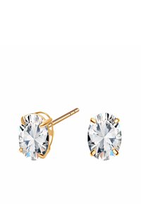 Złote kolczyki w formie sztyftów z dużymi, okrągłymi, przezroczystymi kamieniami z cyrkonii, osadzonymi w ozdobnych czteroramiennych oprawach. Gładkie, polerowane wykończenie.