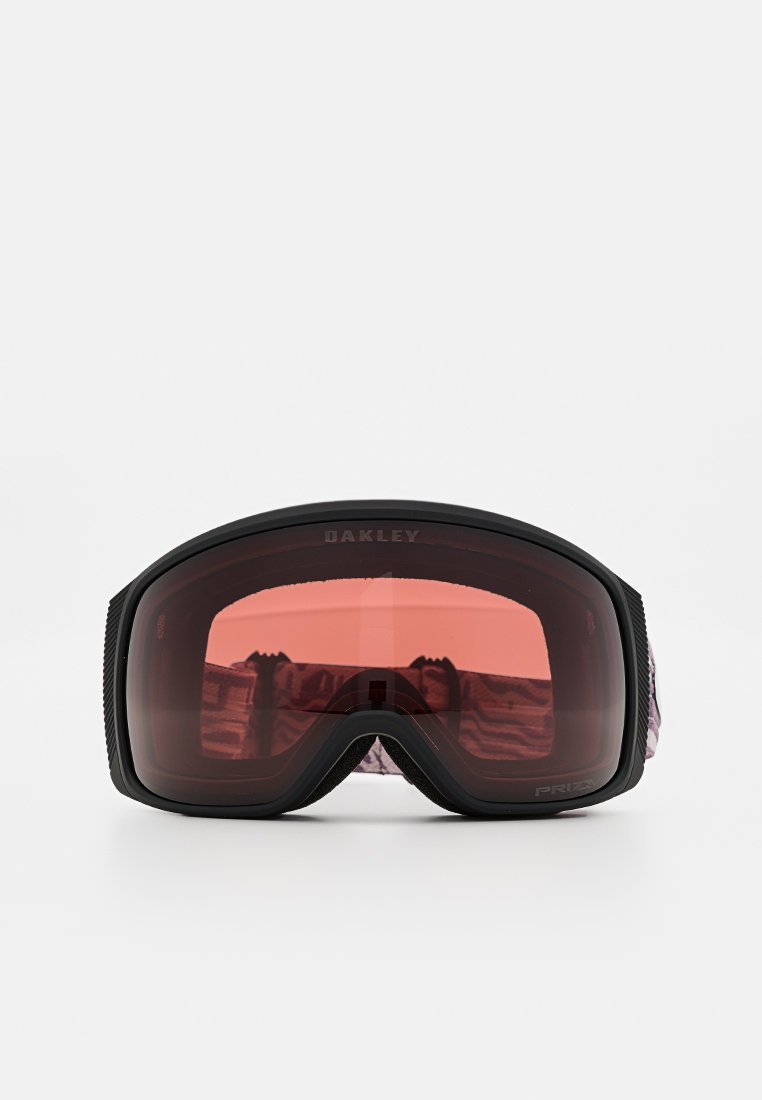 Gogle narciarskie Oakley z czarną ramą, różowymi soczewkami i teksturowanym detalem na pasku. Duży, zaokrąglony kształt zaprojektowany z myślą o widoczności.