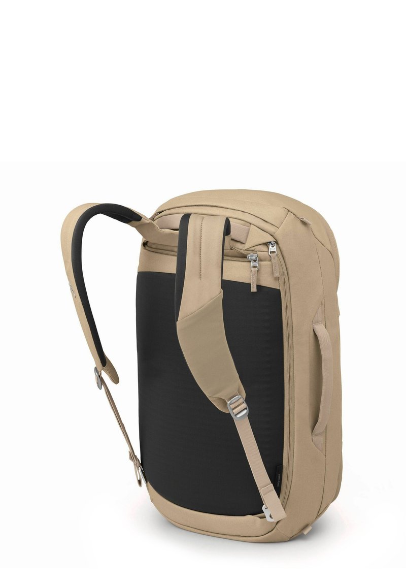 Beige- und schwarze Rucksack mit verstellbaren Trägern, Reißverschlusstaschen und einem strukturierten Stoff. Entworfen in einer schlanken, modernen Form.