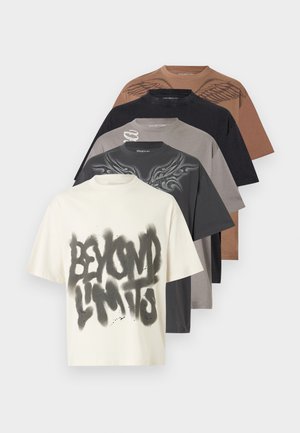 Five short-sleeve t-shirts in brown, black, gray, dark gray, and white with varied graphic designs, front text, and wing artwork on the back.