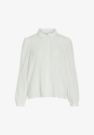 Bela bluzica s ovratnikom, prednjim dugmadi, dugim napuhanim rukavima, teksturiranom tkaninom i izrezbarenim detaljima duž prednje strane.