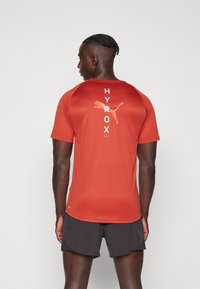Puma HYROX FIT ULTRABREATHE TRIBLEND TEE - T-shirt de sport - mars red