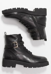 Steven New York Botines camperos - black