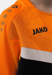 JAKO T-shirt de sport - schwarzorange