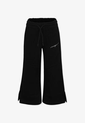 Pantaloni della tuta neri con gambe larghe, vita con cordino e fessure laterali. Presenta un logo bianco a script nella parte anteriore. Materiale in morbido cotone.
