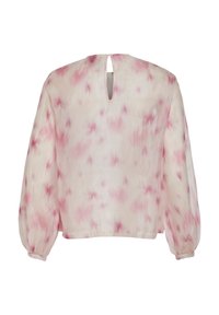 Blouse à manches longues rose clair et blanche avec un motif floral subtil, poignets élastiques et fermeture par petit bouton à l'arrière du col.