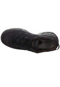 Black hiking shoe with a suede upper, mesh panels, tonal laces, and a rubber sole. Features a brown interior accent and low-profile design.