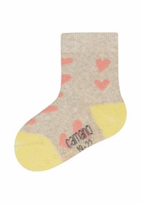 Beige Socken mit rosa Herzmustern, gelben Akzenten an Spitze und Ferse sowie strukturierten Griffpunkten an der Sohle für verbesserten Halt.