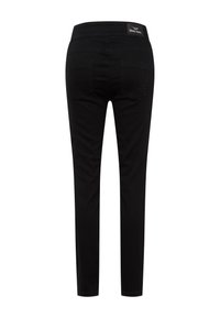 Black stretch pants with a narrow fit, featuring a high waistband, two back pockets, and a small brand label on the waistband.