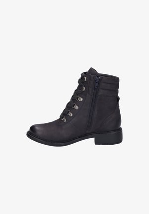 Dark navy ankle boots made of leather, feature a front lace-up design, side zipper, and a low heel with subtle stitching accents.