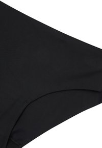 Costume da bagno nero realizzato in tessuto morbido e elastico. Presenta un taglio curvo con un design senza cuciture lungo i bordi per un aspetto pulito.