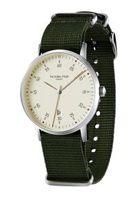 Silver wristwatch with a cream circular dial, marked with black and red accents, on an olive green fabric strap. Date display at 6 o'clock.