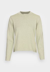 Jasnozielony, ribbed sweter z okrągłym dekoltem i długimi rękawami. Posiada luźny krój oraz jednostajną fakturę w całej długości.