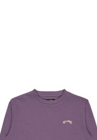 Sweat-shirt violet à col rond, manches longues et poignets côtelés. Logo texte subtil "BILLABONG" en beige. Tissu doux et texturé.