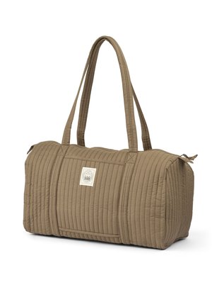 Sac de sport matelassé kaki avec deux poignées en tissu robustes, une forme rectangulaire, une texture subtile et un petit patch logo sur le côté.