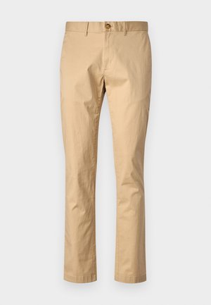 Beige cotton trousers with a straight cut, featuring a front button closure and belt loops. Smooth texture with minimal accents.