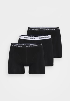 Trīs melnu vīriešu bokseru šortus ar elastīgiem jostām, uz kuriem baltiem burtiem ir uzraksts "BJÖRN BORG". Gluda tekstūra un pieguļošs dizains.