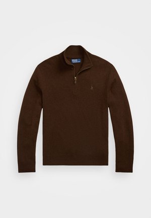 Jersey marrón con cuello alto, media cremallera y puños acanalados. Hecho de un suave tejido de punto, presenta un pequeño logo en el pecho.