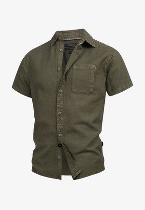 Kurzärmeliges Hemd in olivgrün, aus weichem Stoff, mit einer Brusttasche und einem leicht abgerundeten Saum.