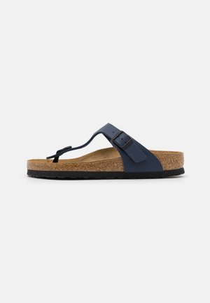 Infradito navy con soletta in sughero, suola in gomma e cinturino regolabile con fibbia. Design semplice con base imbottita.