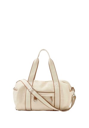 Sac polochon en toile beige avec double poignée, poche zippée sur le devant, bandoulière réglable et fermoir métallique sur fond blanc.