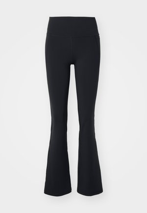 Black flared yoga pants made from stretch fabric with a high waistband and seamless design. Smooth texture, suitable for active wear.
