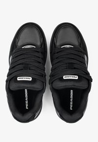 Black athletic shoes with a mix of smooth leather and textured mesh. Features padded collar, thick laces, and brand logo on the tongue.