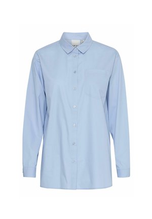 Svetlo modra srajca z dolgimi rokavi, ovratnikom, enim žepom na prsih in gladko bombažno teksturo. Ima bele gumbe spredaj.