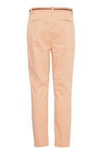 Plonas smėlio spalvos kelnės iš nugaros pusės su diržo kilpomis, dviem įsiuvų kišenėmis ir tiesiai kirptomis kojų galais.