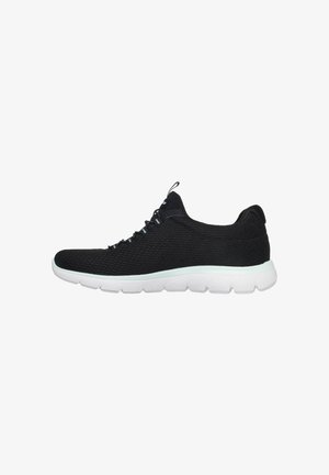 Black athletic shoe made of knit material, featuring a white sole, lace-up design, and textured upper with a pull tab at the heel.