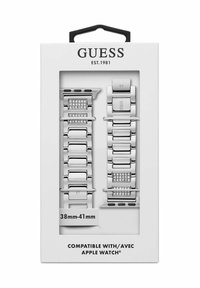 Hõbedased metallist käevõrud ristkülikukujuliste linkidega ja kristalliliste detailidega, esitatud valges pakendis, mis on märgistatud 38mm–41mm Apple Watchi ühilduvuseks.