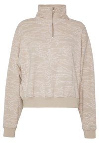 Beige svetari, jossa on puolivetoketjullinen kaulus ja hienovarainen tekstuuri. Resorit hihansuissa ja helmassa, rento istuvuus. Päällitikkattu logotunnus.