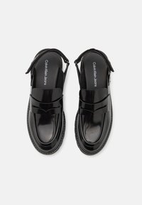 Calvin Klein Jeans COMBAT SLING MULE - Jalga libistatavad jalanõud - triple black