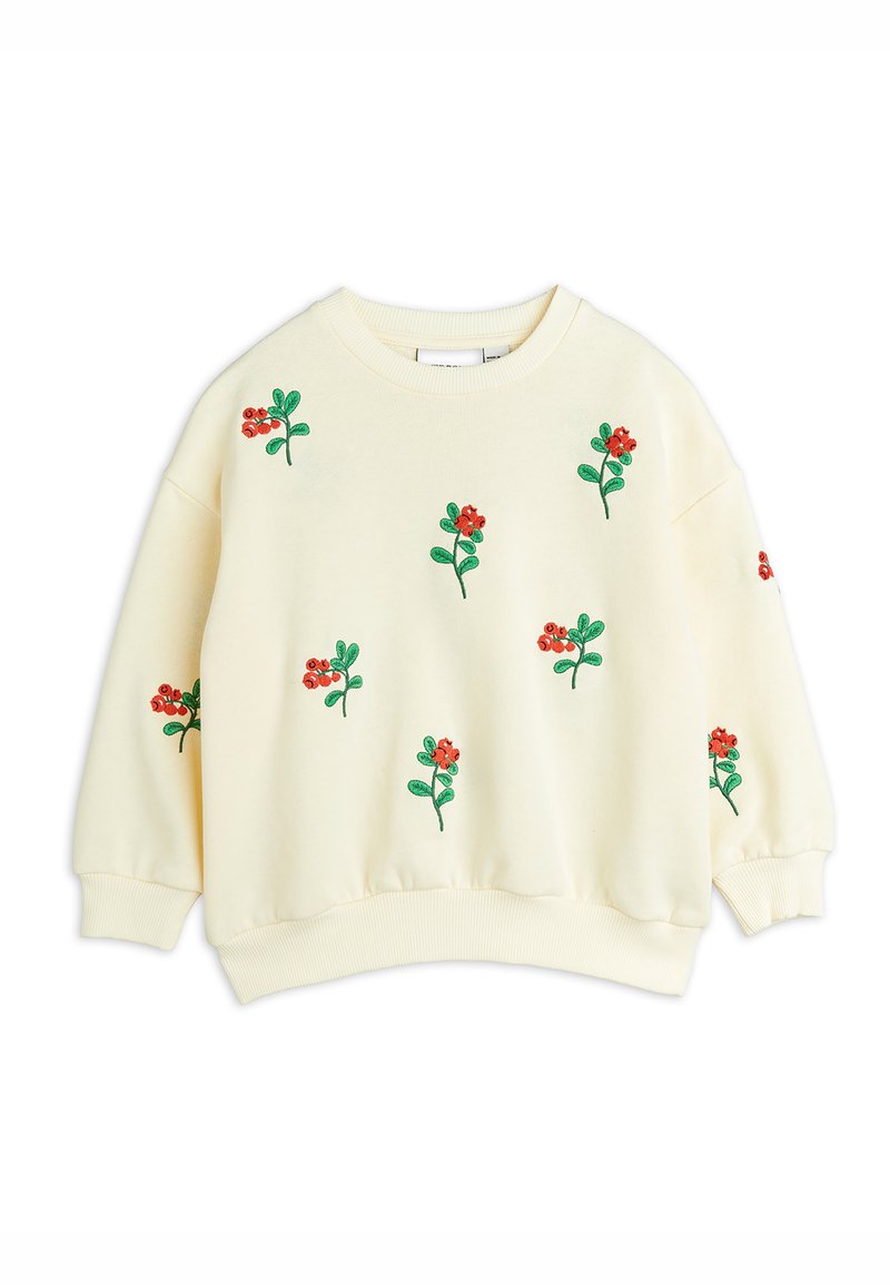 Felpa color crema con maniche lunghe, caratterizzata da fiori rossi ricamati e foglie verdi in un motivo sparso. Texture morbida e polsini a coste.