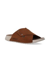Bruine suède slipper met open teen, kruisbandontwerp en decoratieve stiksels; lichte witte rubberen zool, merknaam "VENEZIA" zichtbaar.