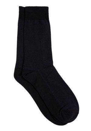 Sorte sokker med ribbet manchet, tekstureret krop og glat fodområde. Materialet ser blødt ud, uden synlige mønstre eller accenter.
