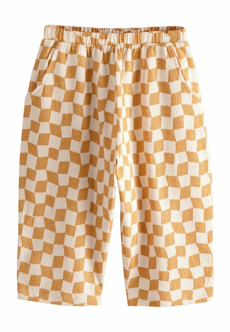 Loungewear-Shorts aus einem strukturierten Stoff mit einem gelb-weißen Schachbrettmuster, elastischem Taillenbund und seitlichen Taschen.